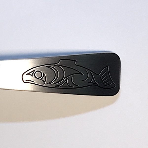 Salmon design on pewter server handle