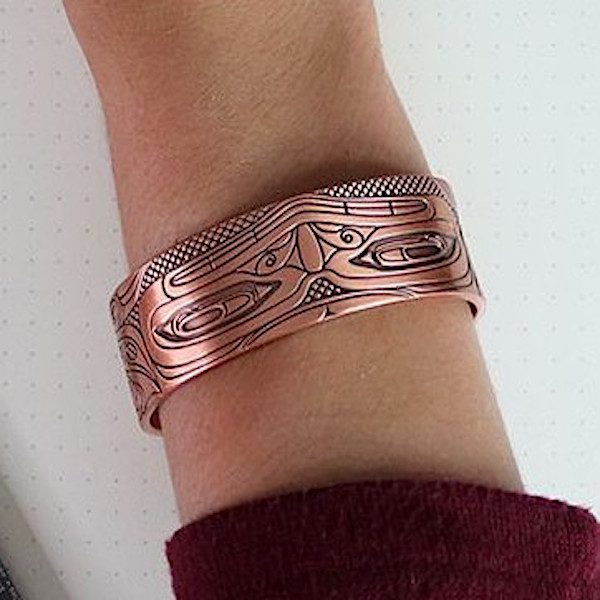 Copper Bear bracelet on wrist