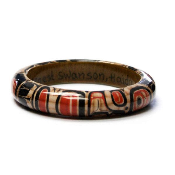 3/4 inch wide wood bangle with Elements of Tradition design